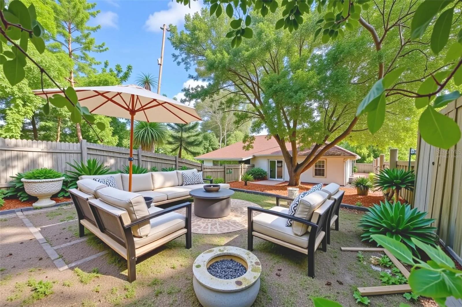 “virtually staged” view from back of lawn