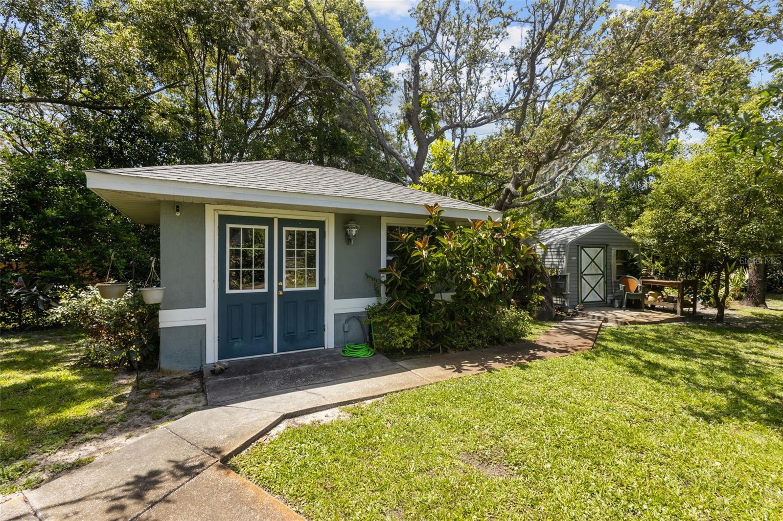 Charming cottage in backyard