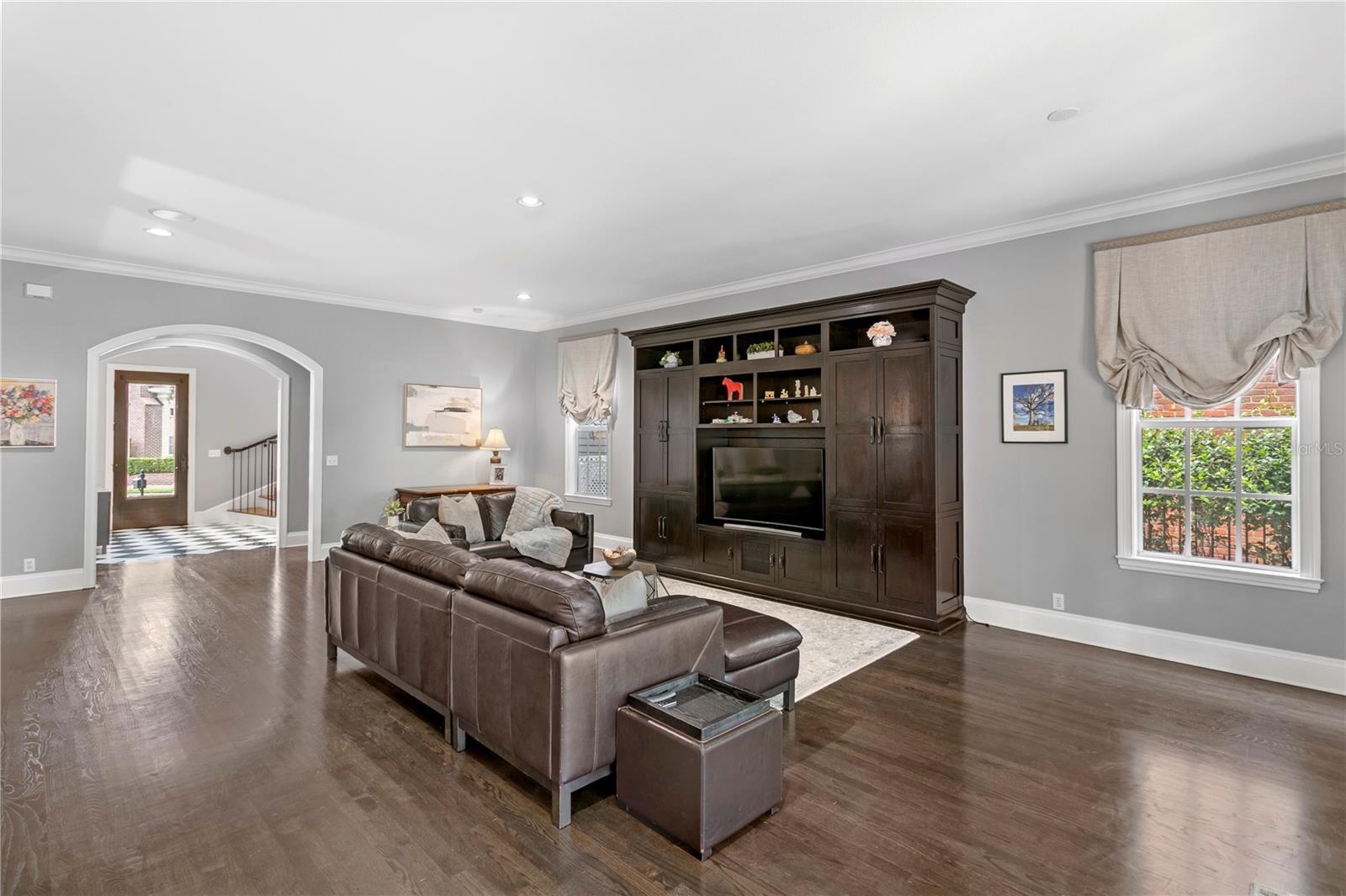 Designed for comfort and connection, the great room offers generous space for oversized sofas and plenty of seating.