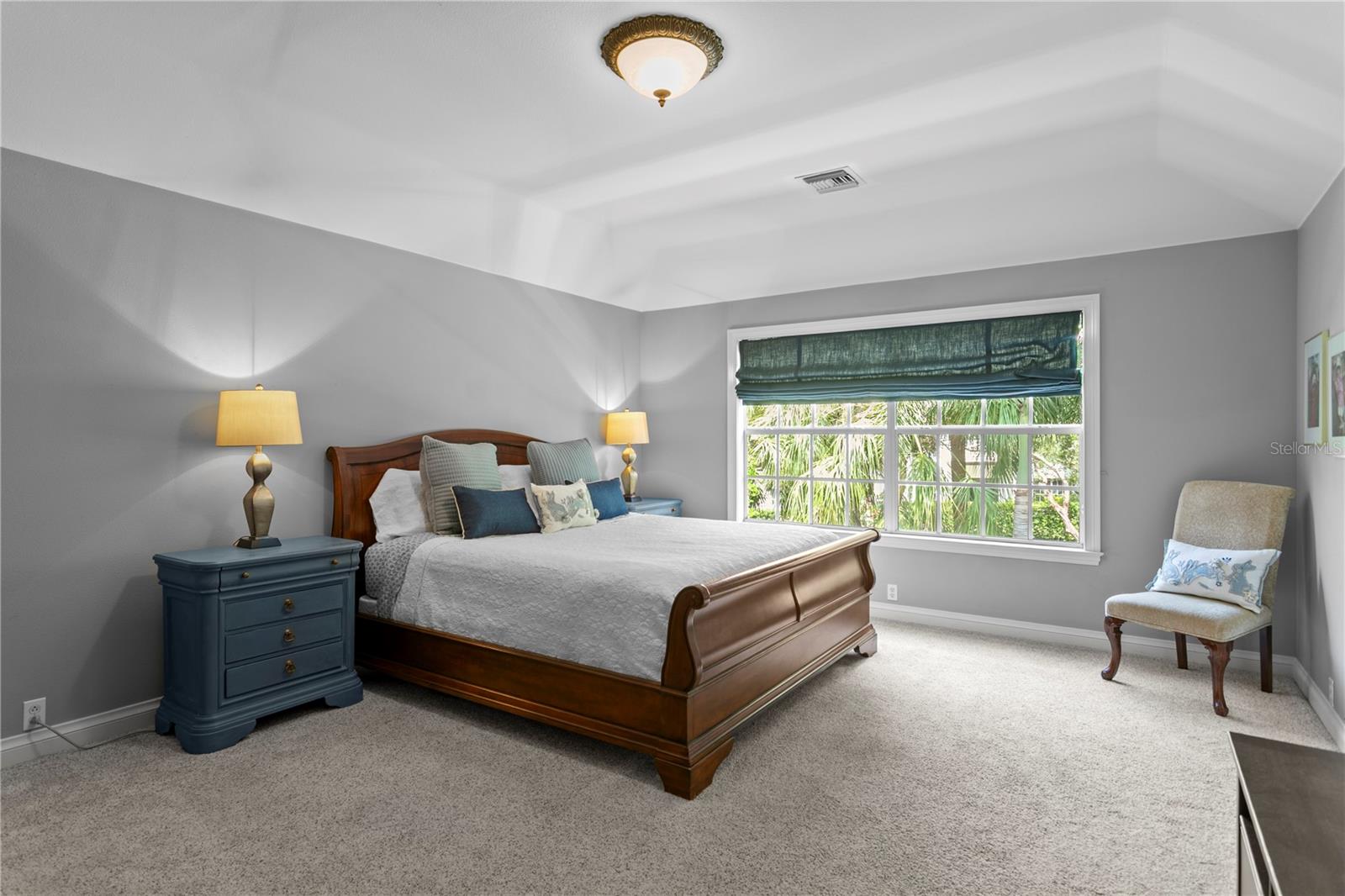 The primary suite overlooks Central Park’s beautifully landscaped grounds