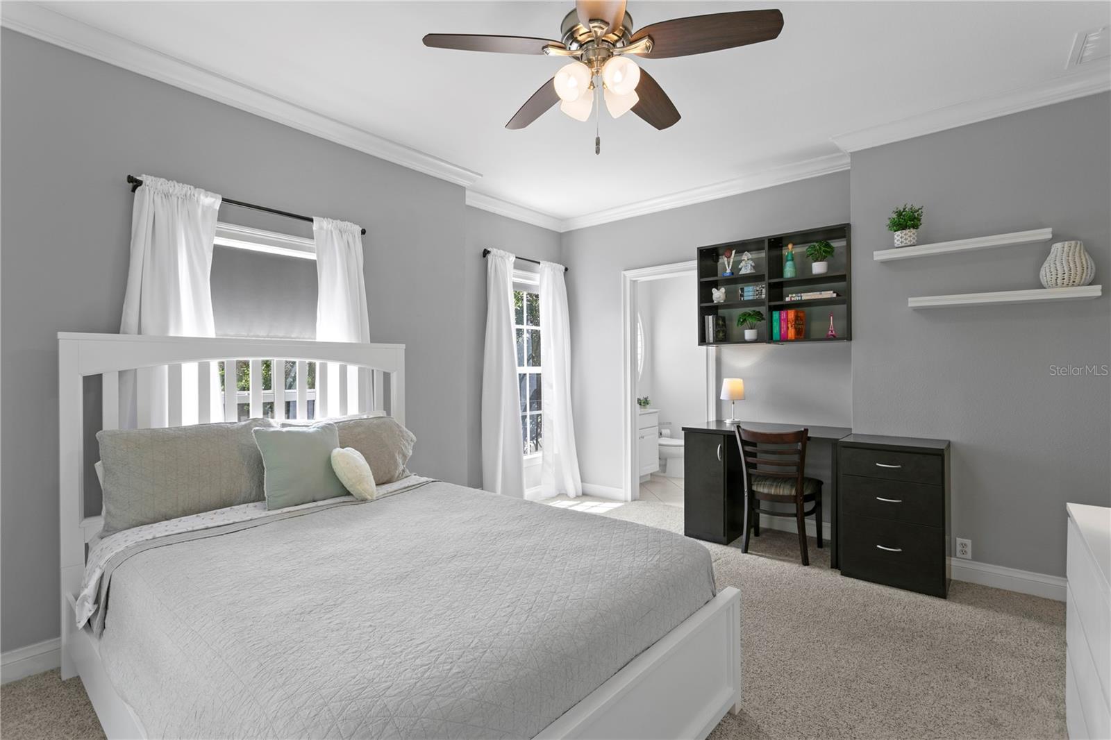 Nicely sized secondary bedroom offers plenty of space for a bed and a dedicated desk area