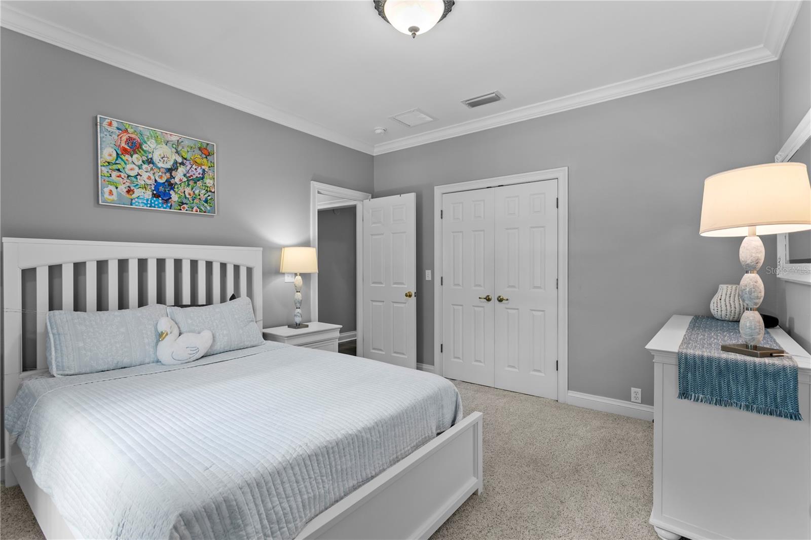 Nicely sized third bedroom offers plenty of space for a bed and a dedicated desk area