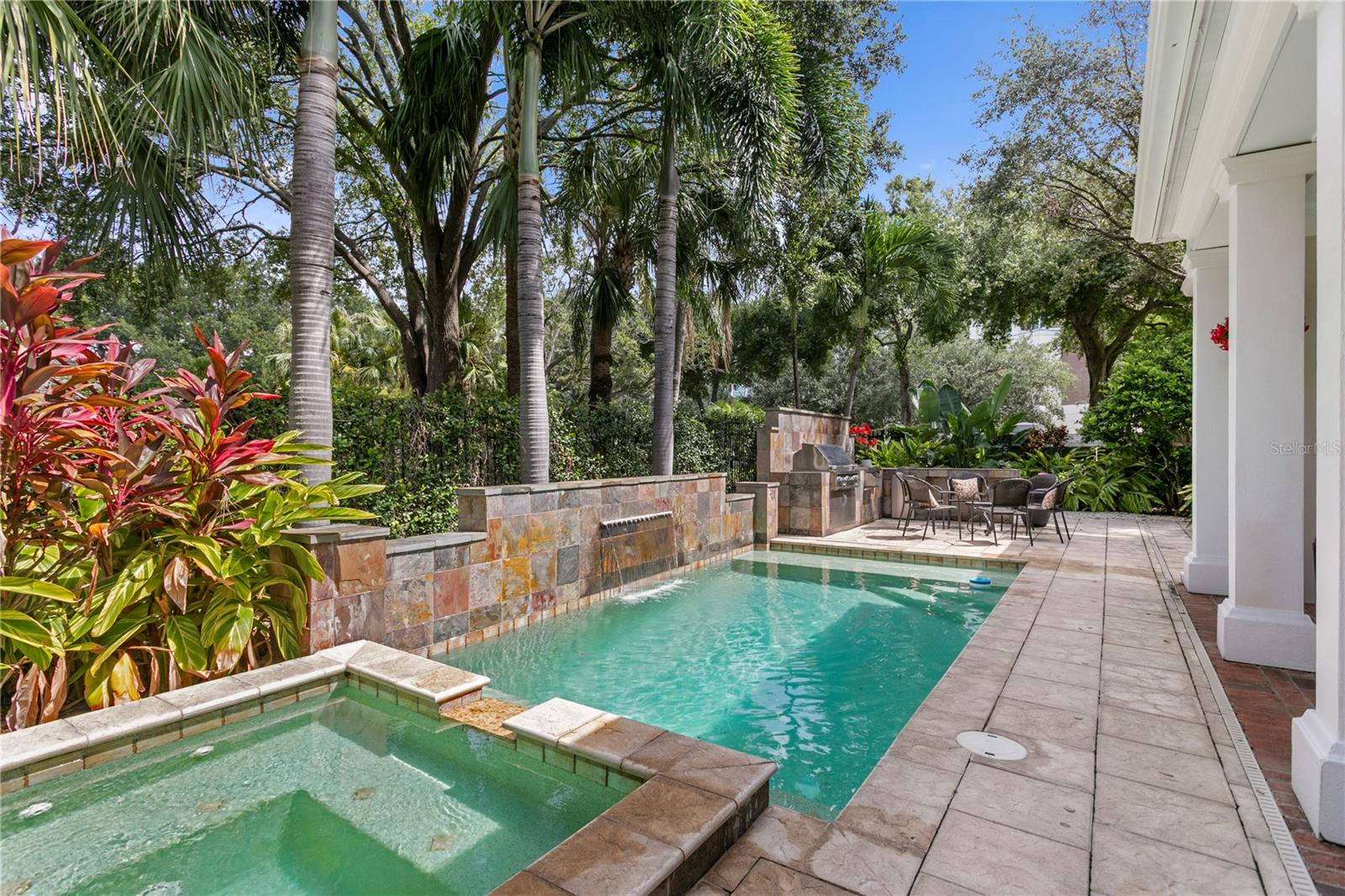 This stunning pool provides a refreshing centerpiece for outdoor living and fun-filled gatherings.
