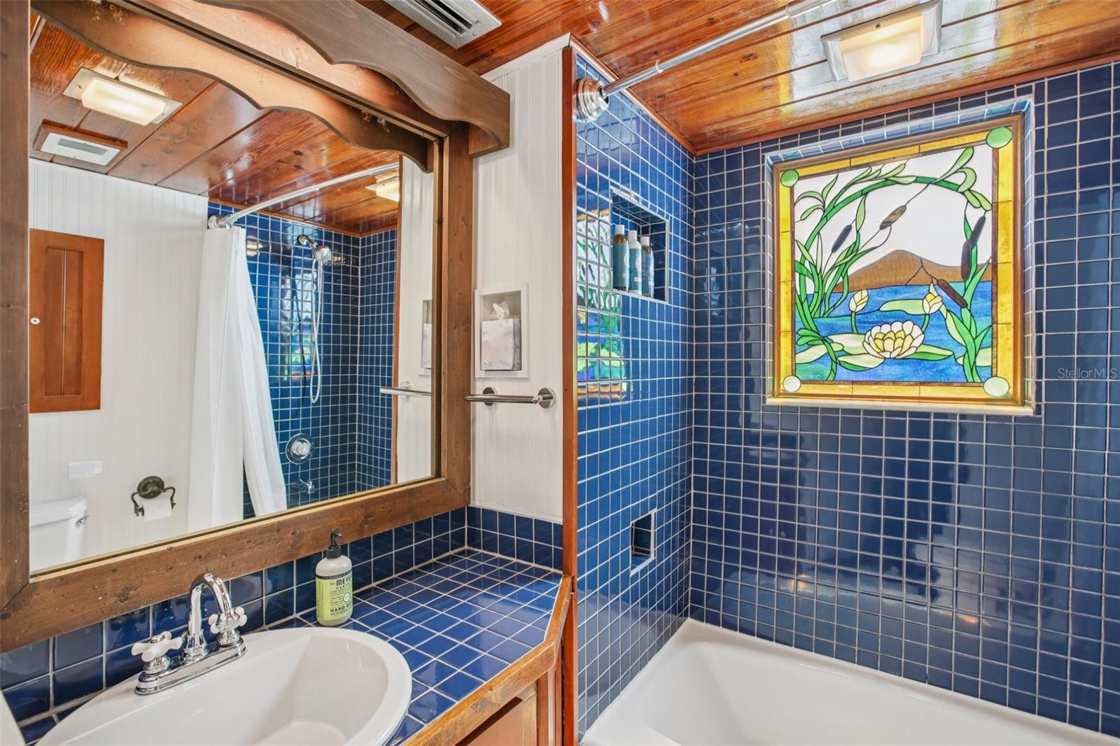 Main House 2nd full bathroom with antique glass