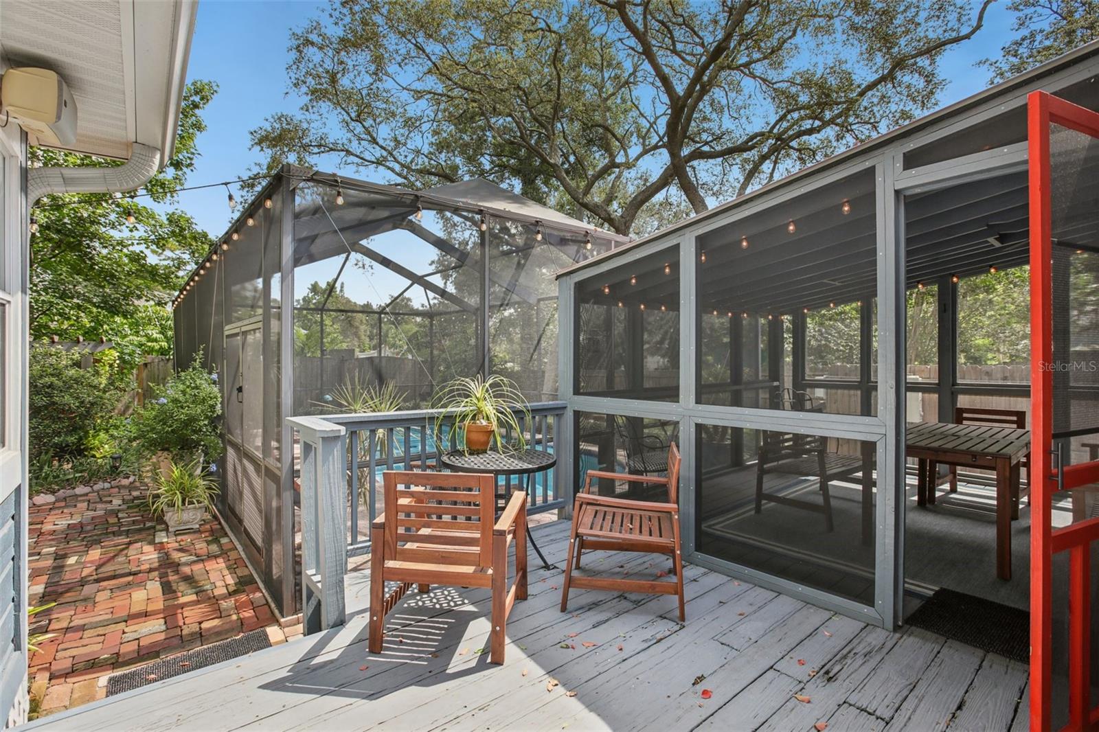 Patio deck outside main house and into screened patio area.