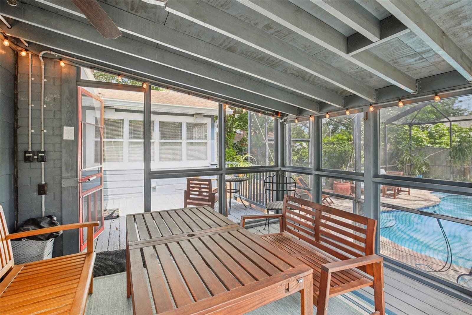 Additional view of screened patio looking toward the entrance