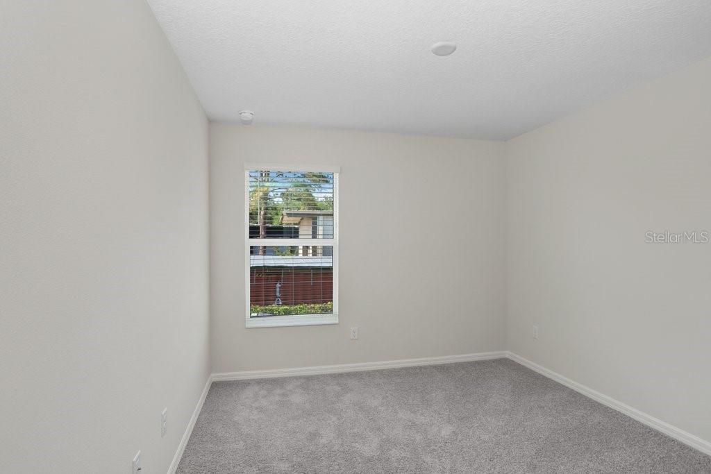 Bedroom 2 (photo of model home)
