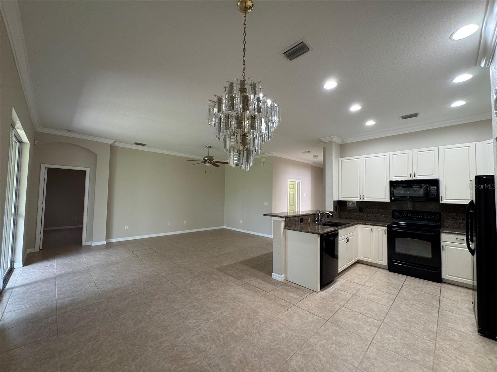 INTERIOR FEATURES CROWN MOULDING IN EVERY ROOM