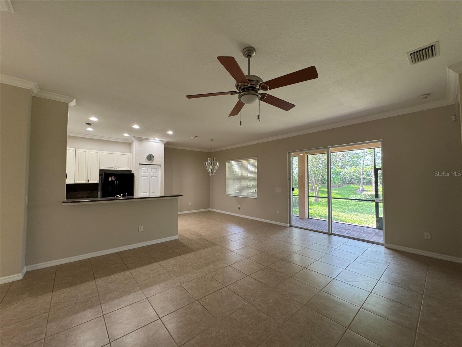 INTERIOR VIEW SHOWING SLIDERS TO LANAI & GARDEN