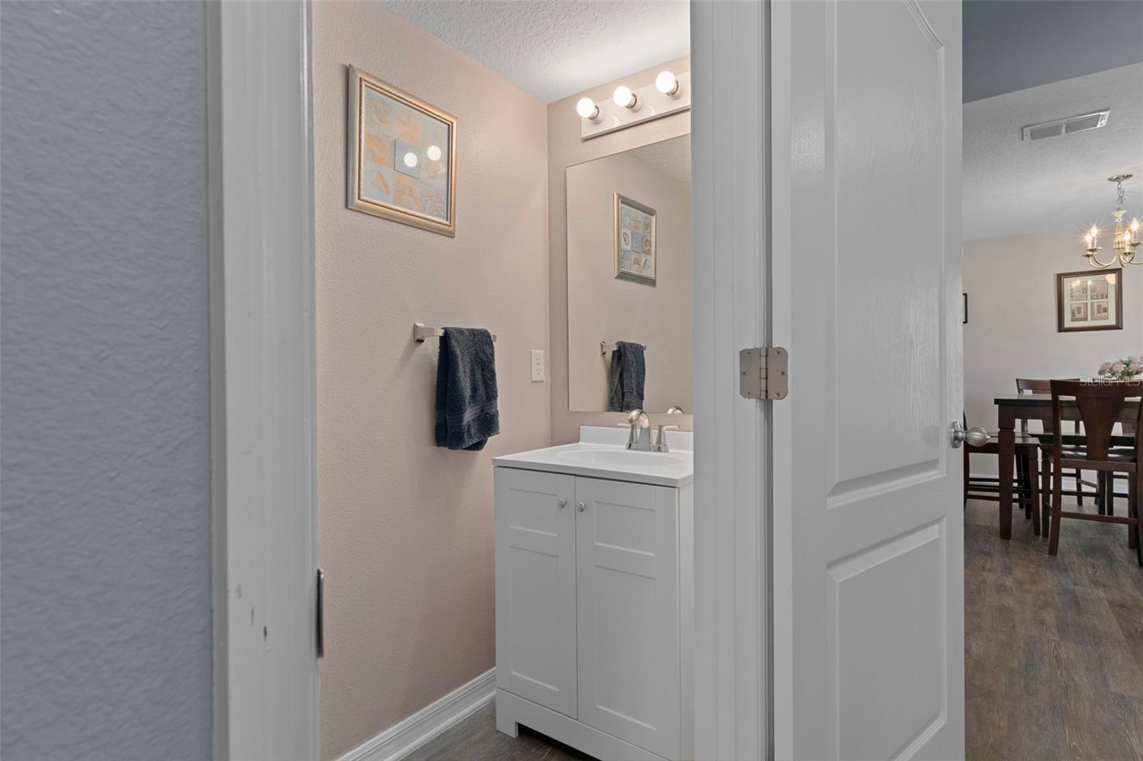 There is a convenient half bathroom on the first floor of the Home