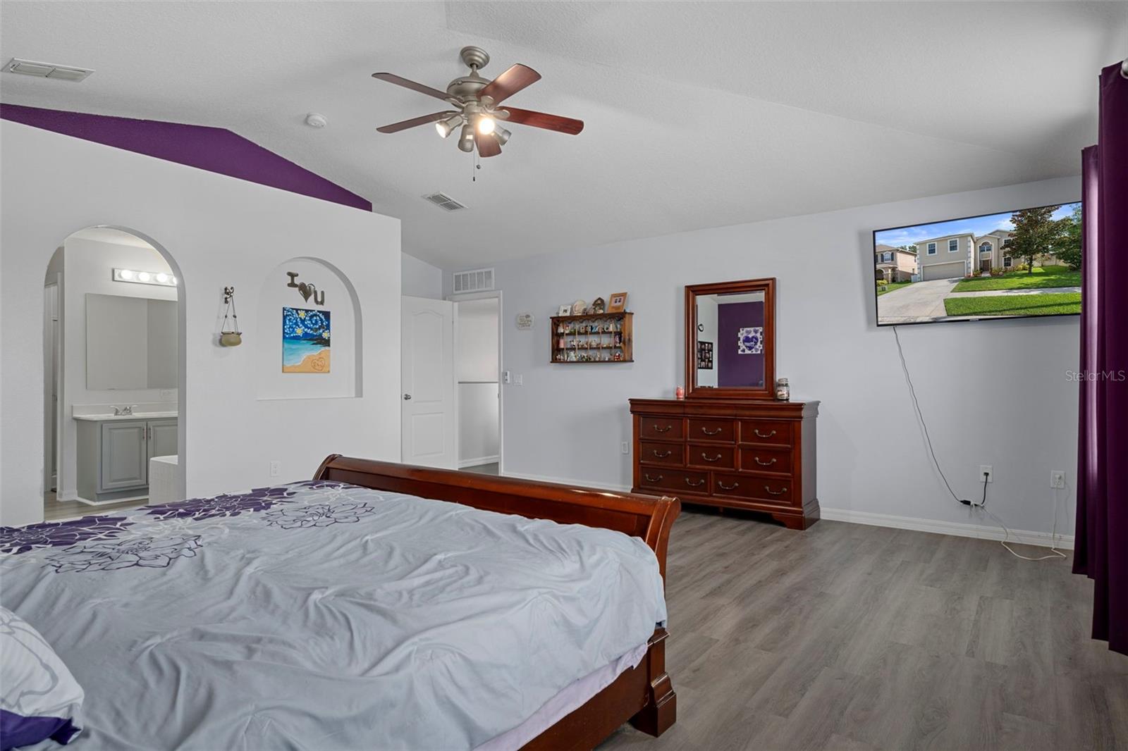 Notice the newer fan/light in the ,aster Bedroom
