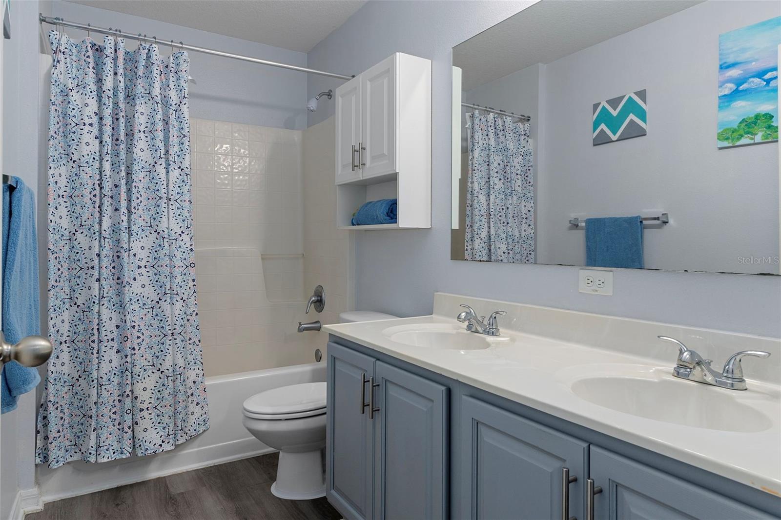 The Guest Bathroom has a tub/shower combo