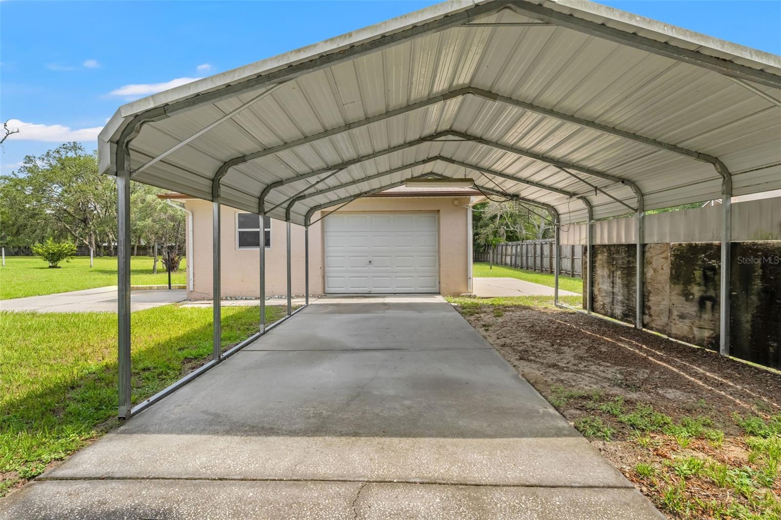 carport and detached garage/workshop