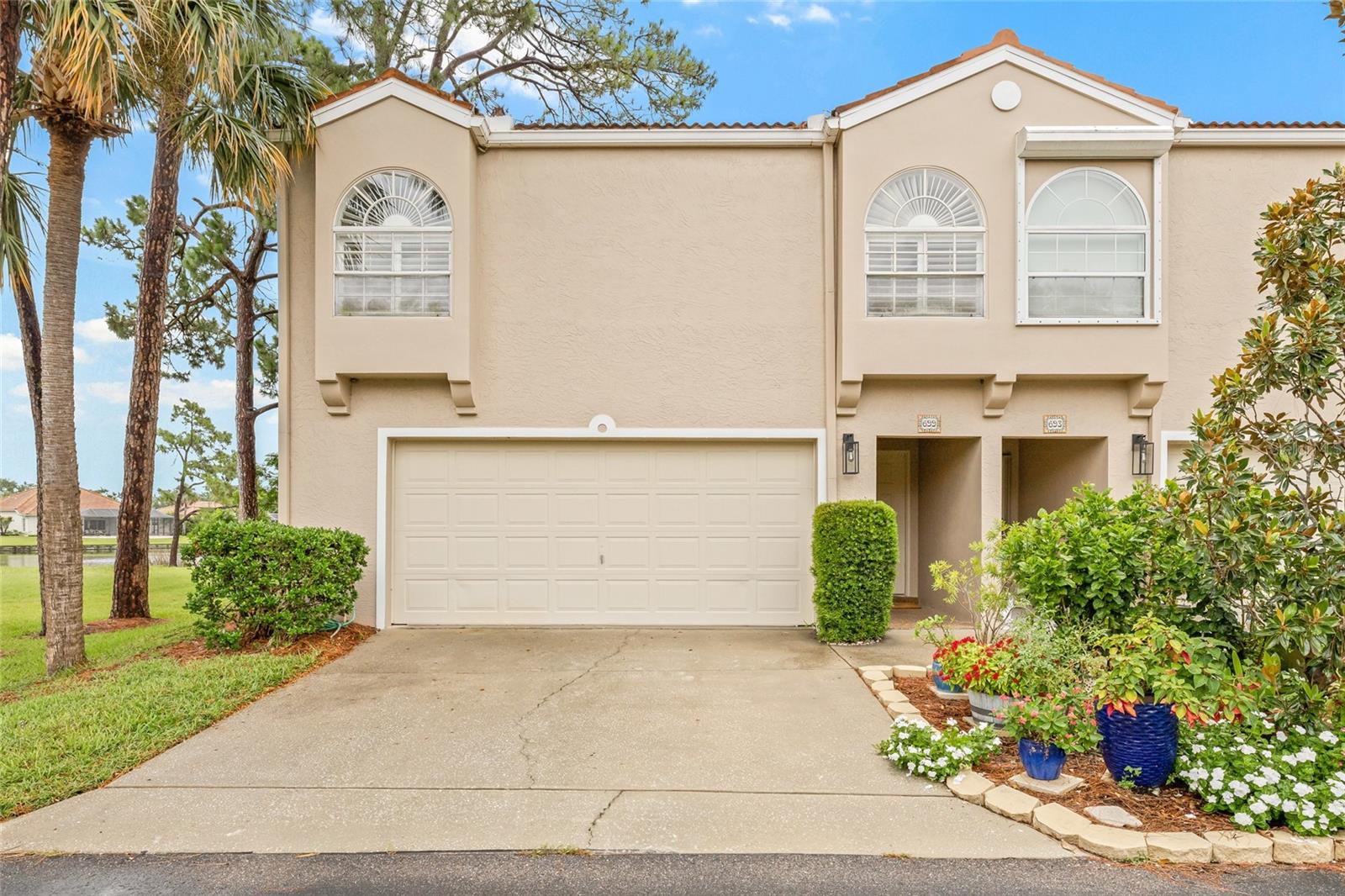 Enjoy a maintenance free lifestyle in this end unit 2-story condo in Placido Bayou.