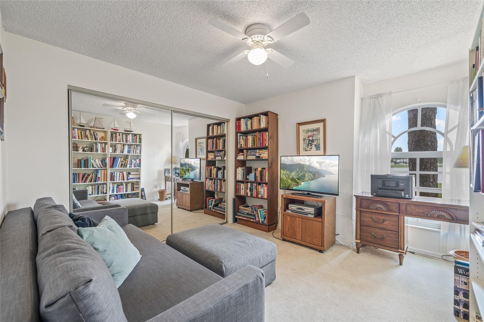 Bedroom located on the first floor with an adjacent full bathroom.