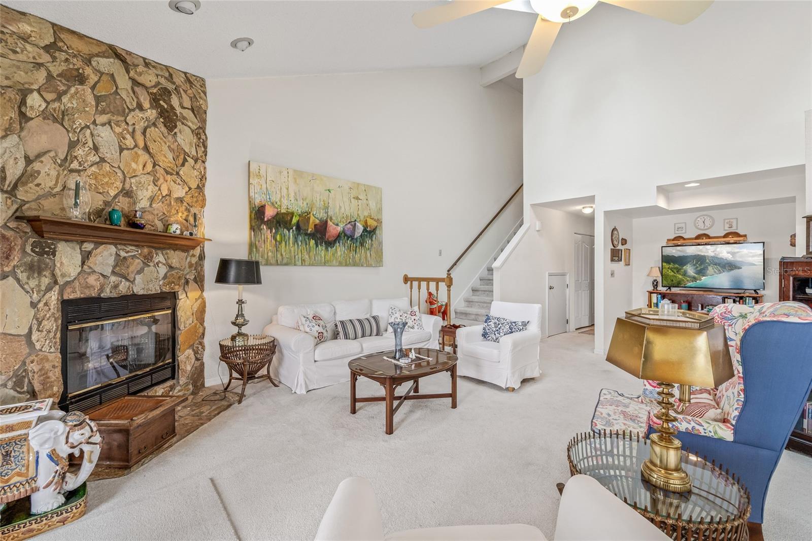 Stairs lead to 3 bedrooms upstairs.