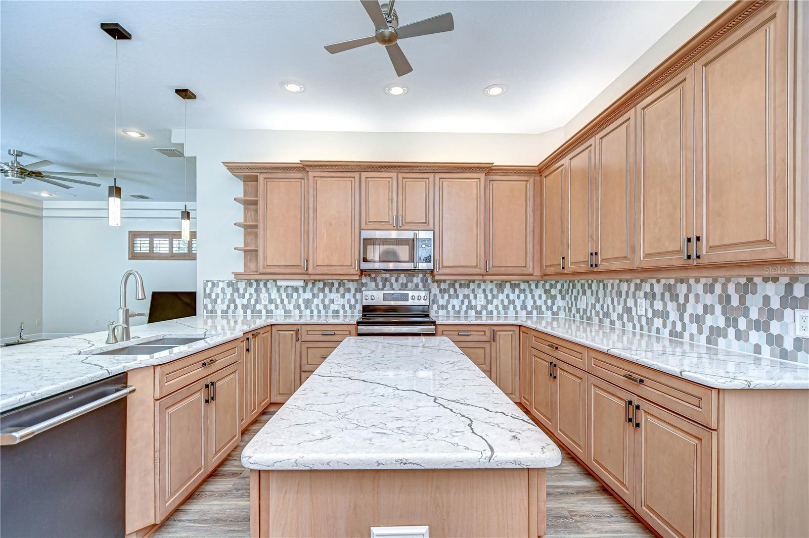 Huge center island and beautiful back splash!
