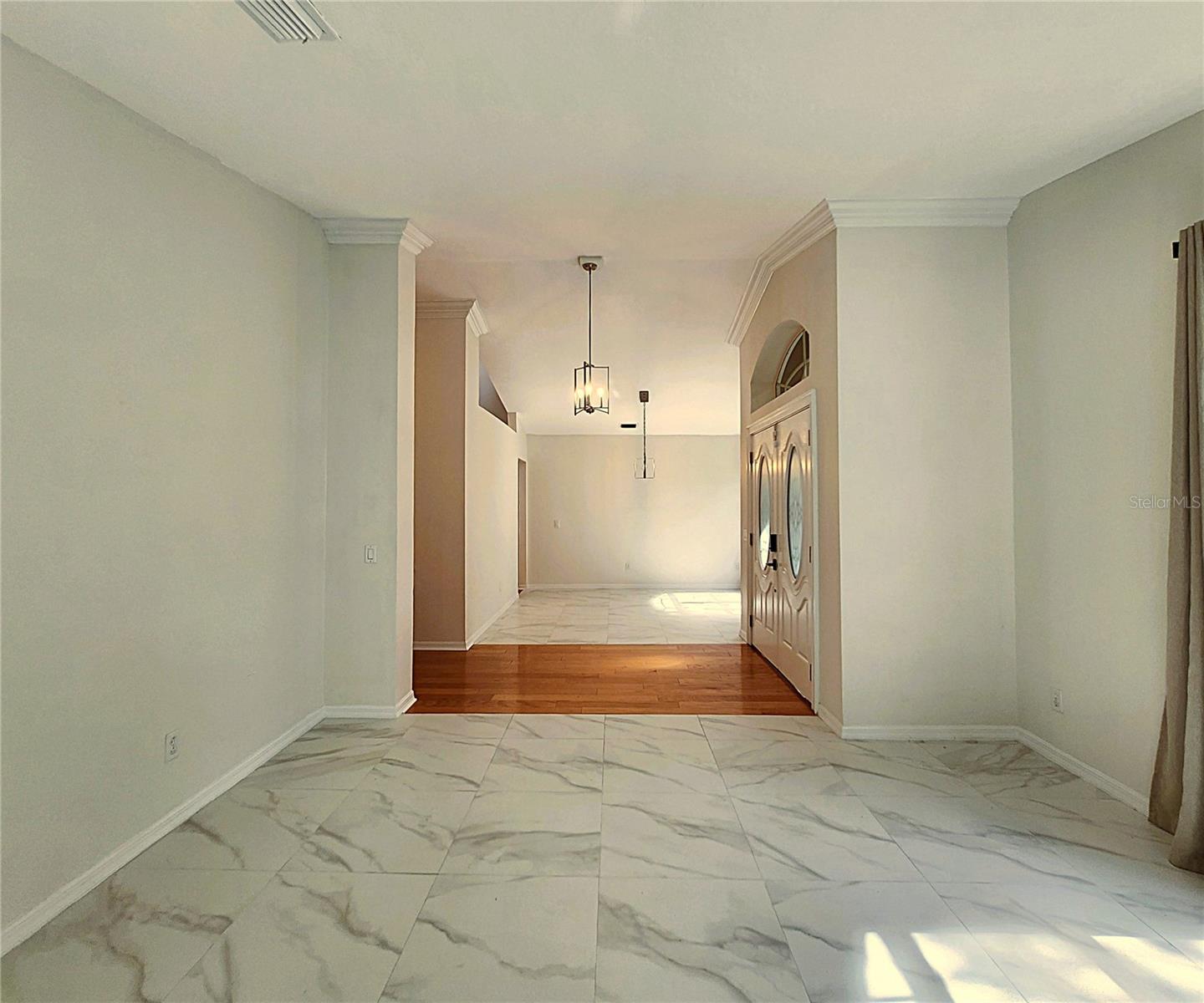 Formal Living Room, Foyer, and Formal Dining Room
