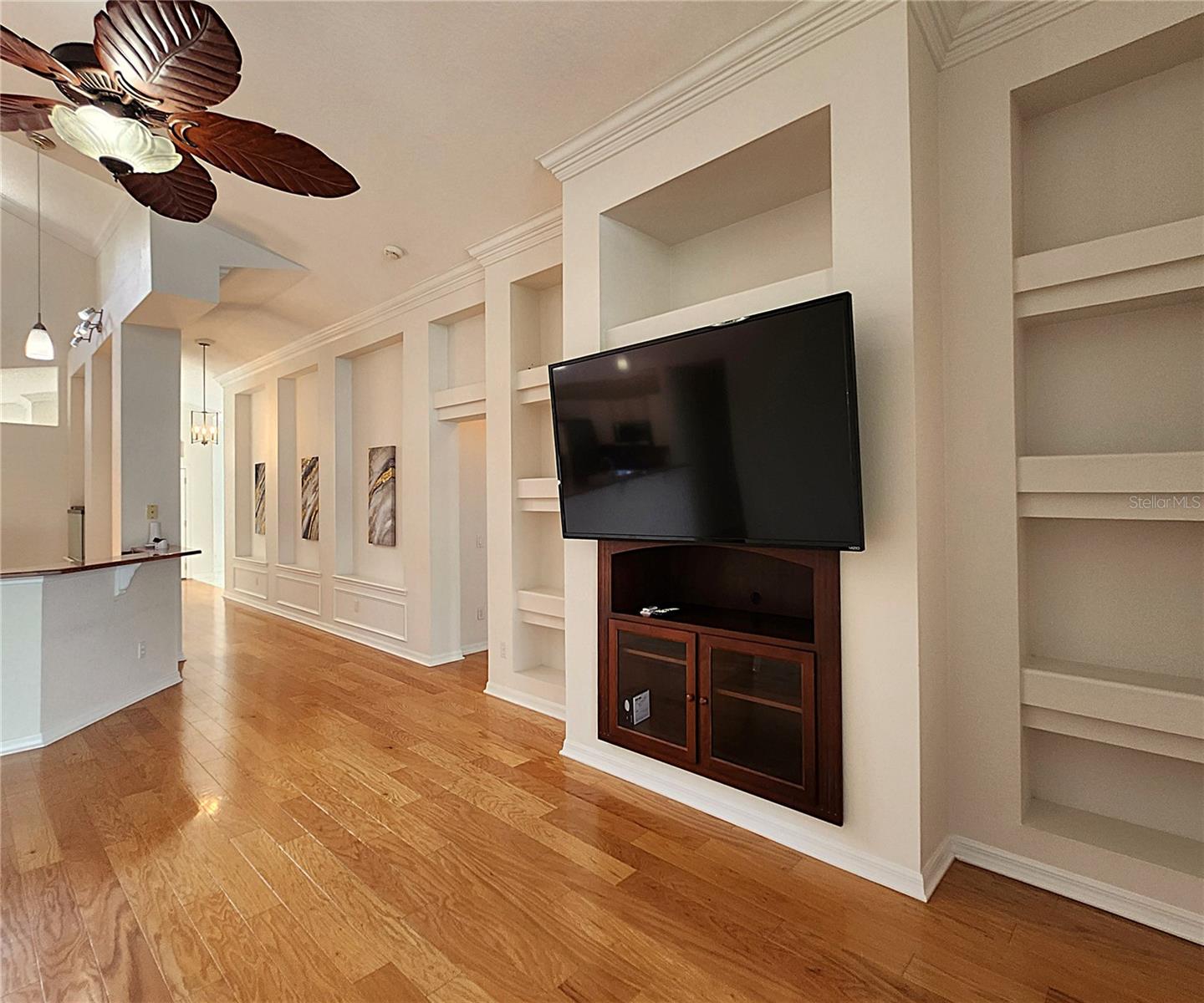 Family Room Built-Ins. Mounted TV is included with the sale