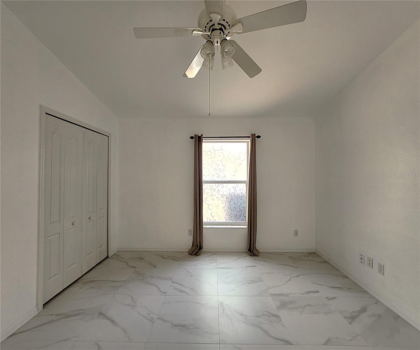 Guest Bedroom 1: Built-In Closet, Elevated Ceilings, Ceiling Fan