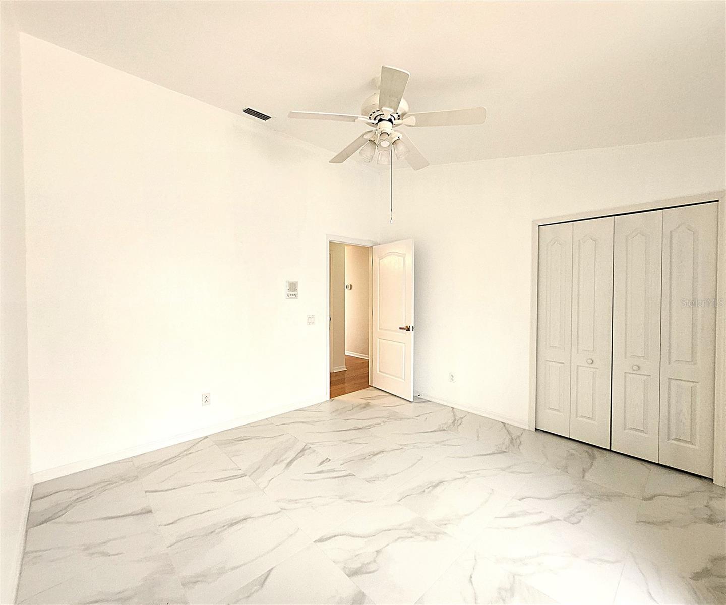 Guest Bedroom 1: Built-In Closet, Elevated Ceilings, Ceiling Fan