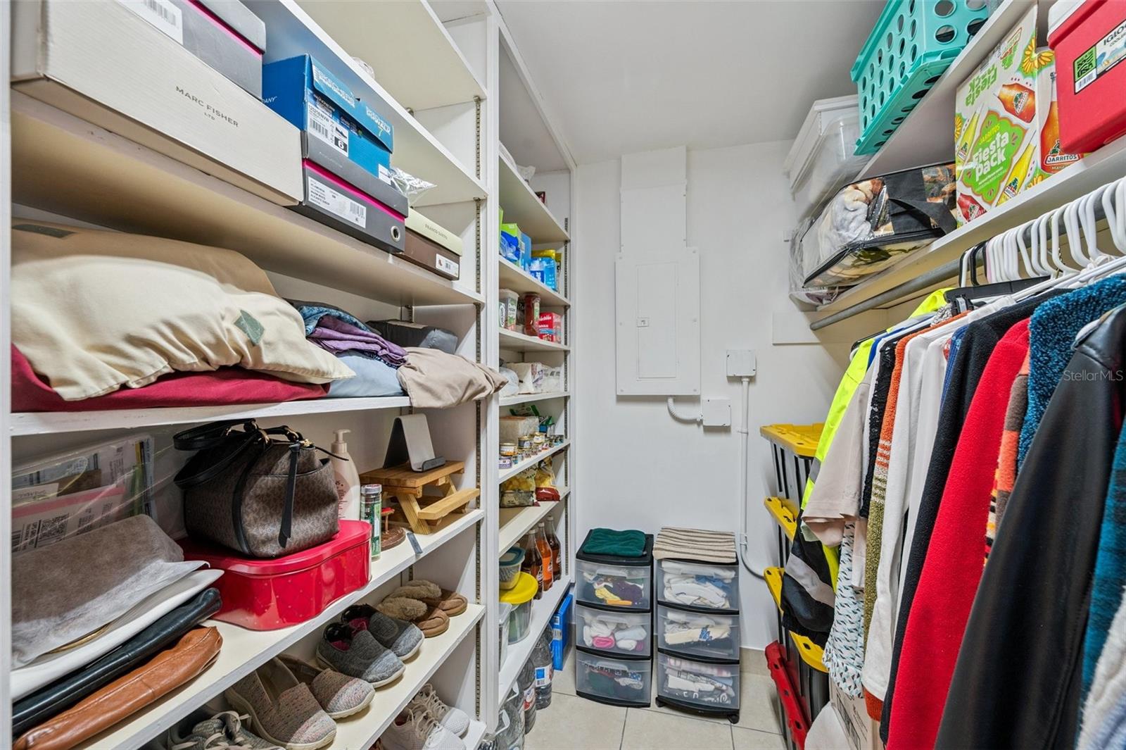 Walk in closet in primary bedroom