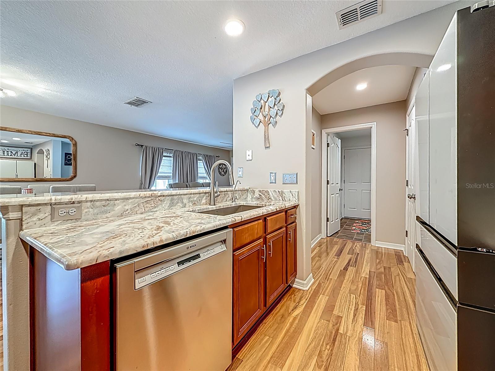 Kitchen - Hall to Pantry and Laundry Room - Garage