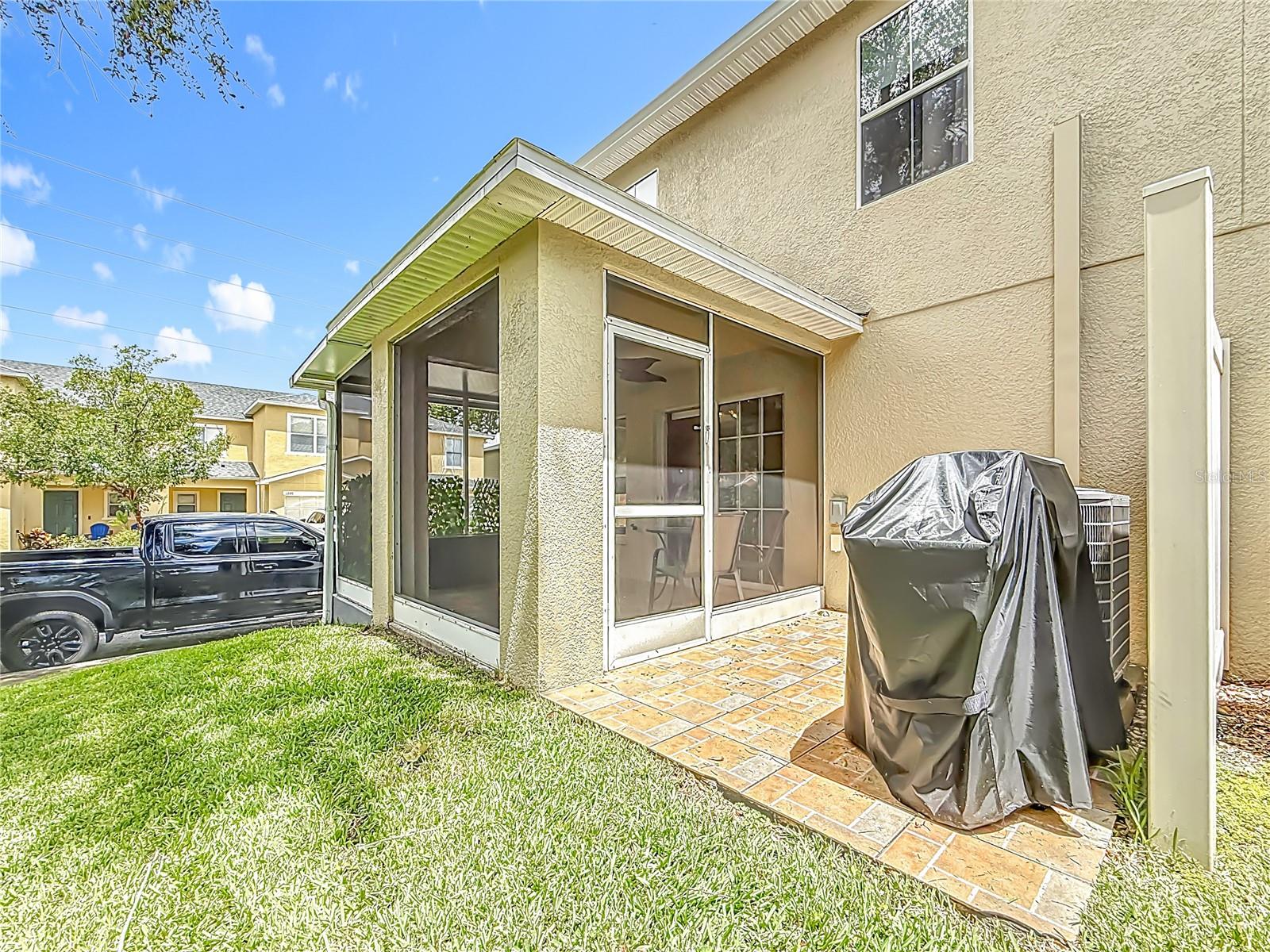 Outdoor Entertaining Space perfect for grilling and Green Space