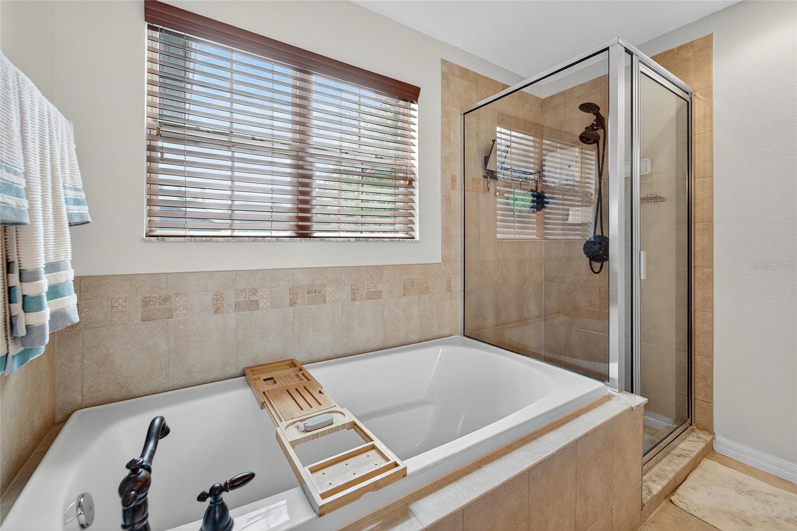 Soaking garden tub with separate shower