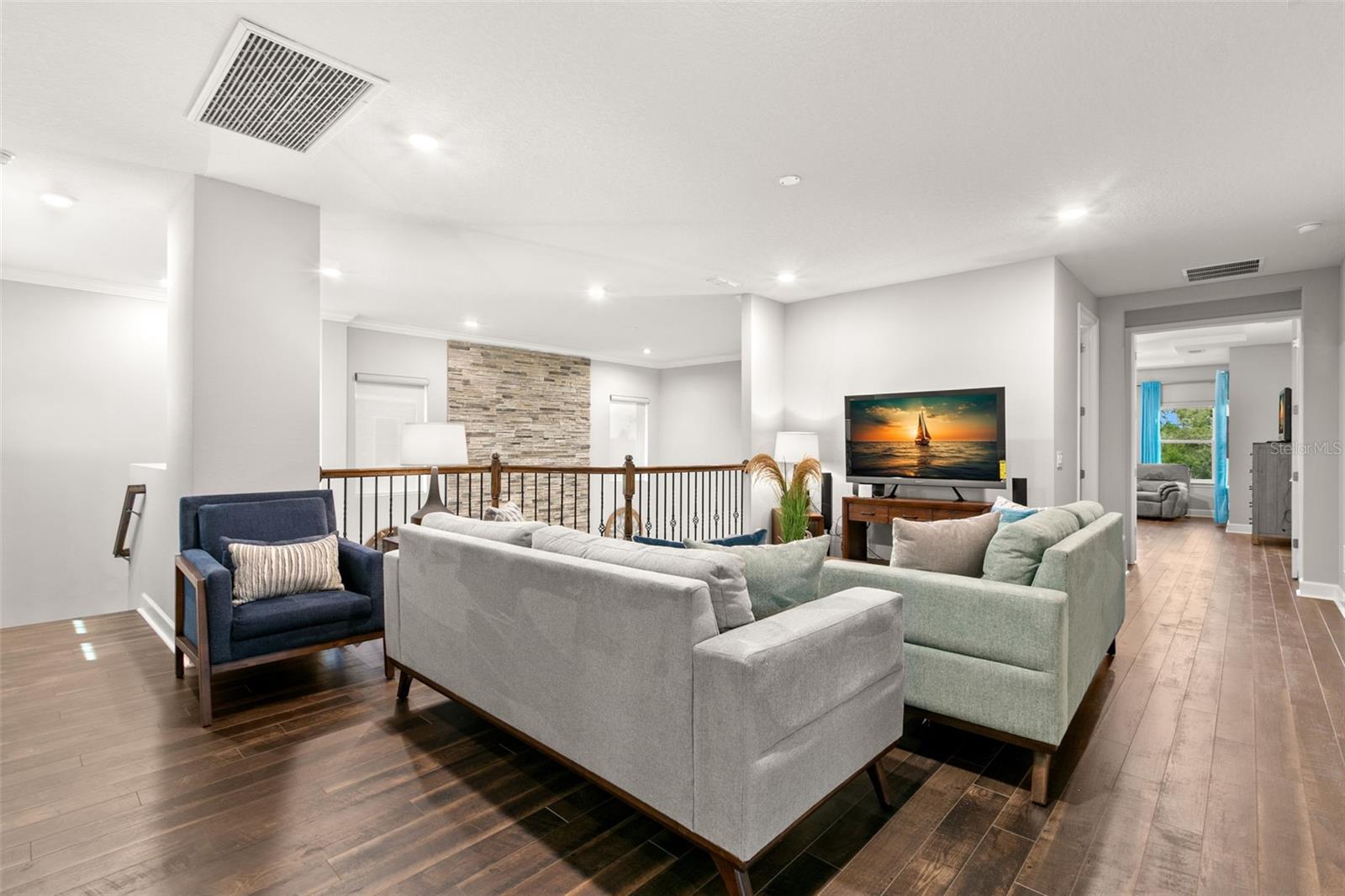 Second floor loft open to gret room below