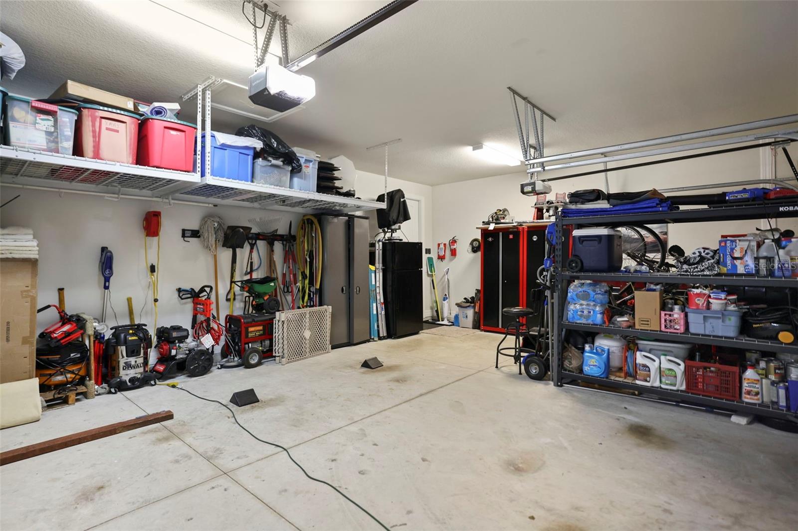 garage with overhead storage racks