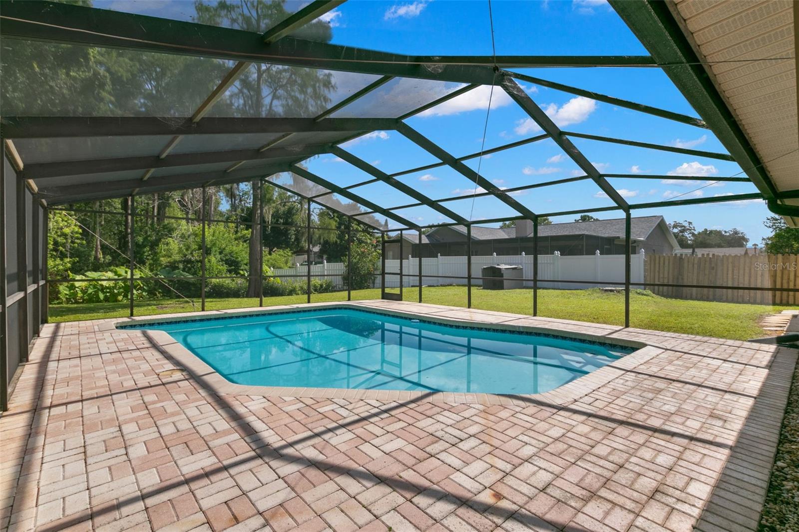 View of oversized pool and Preserve