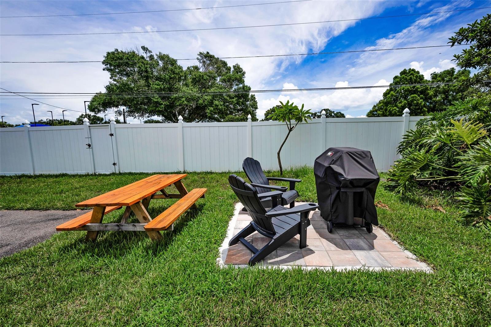 Building 970/M's convenient gas grill and picnic area