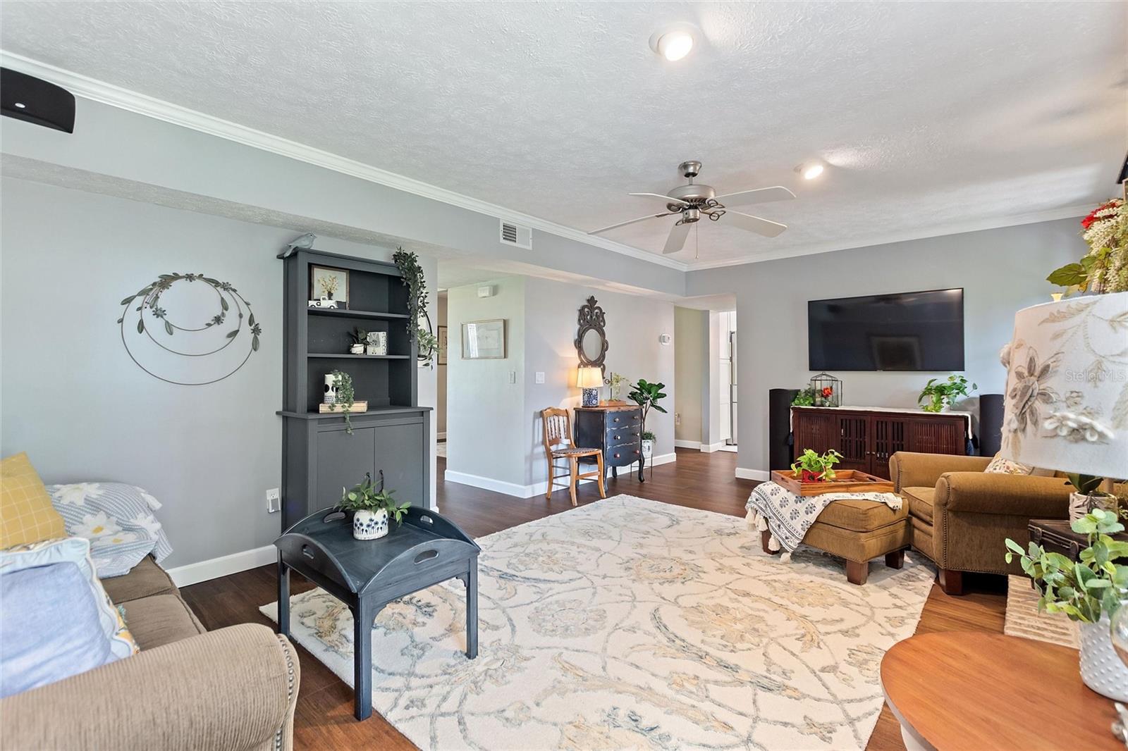 Reverse view of the family room.  The doorway in the back leads back to the kitchen, powder room and formal dining room.