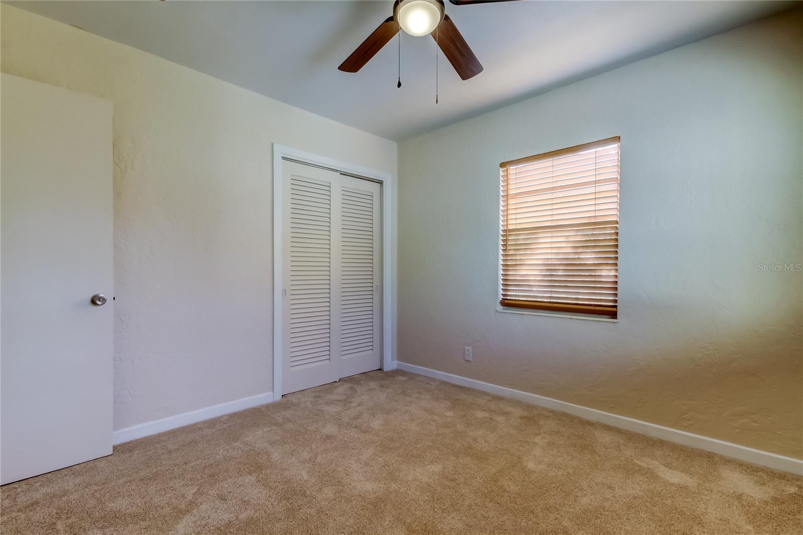 Second bedroom showing closet.