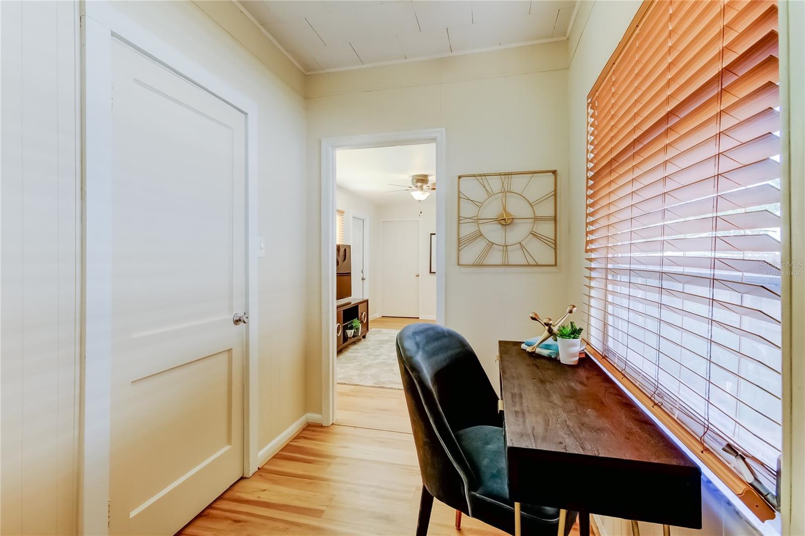Pass through area looking towards Family room, which could also be used as the 3rd bedroom, as it has a walk in closet.