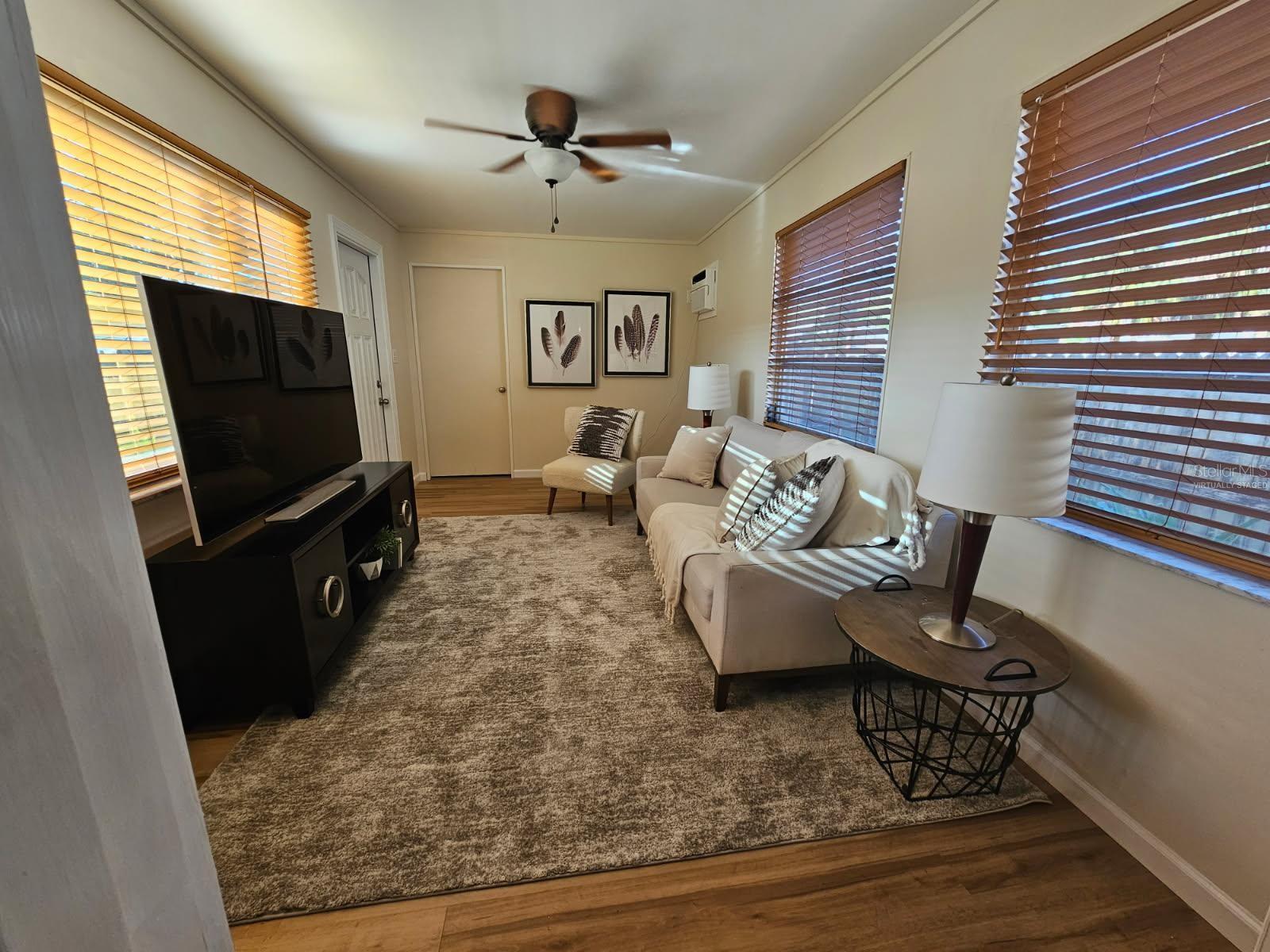 Family room or third bedroom. Walk in closet behind door.
