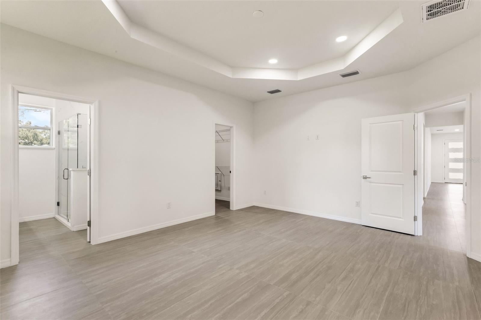 tray ceiling in Primary Bedroom