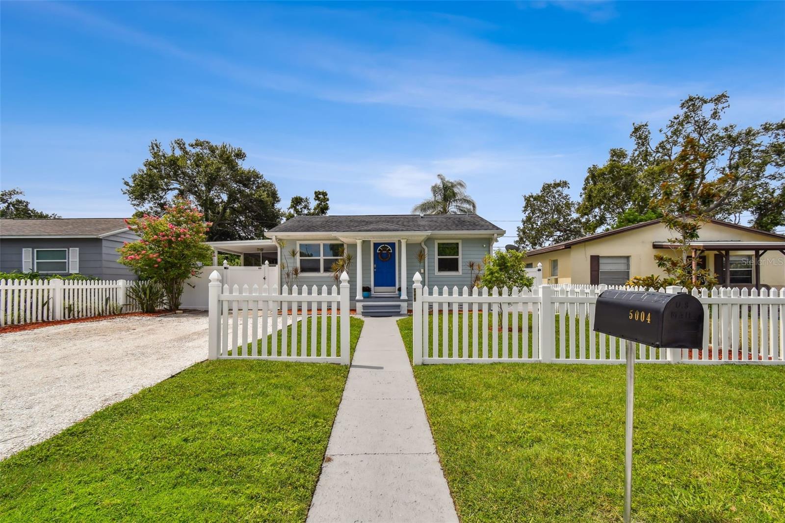 With its own PVC picket fence