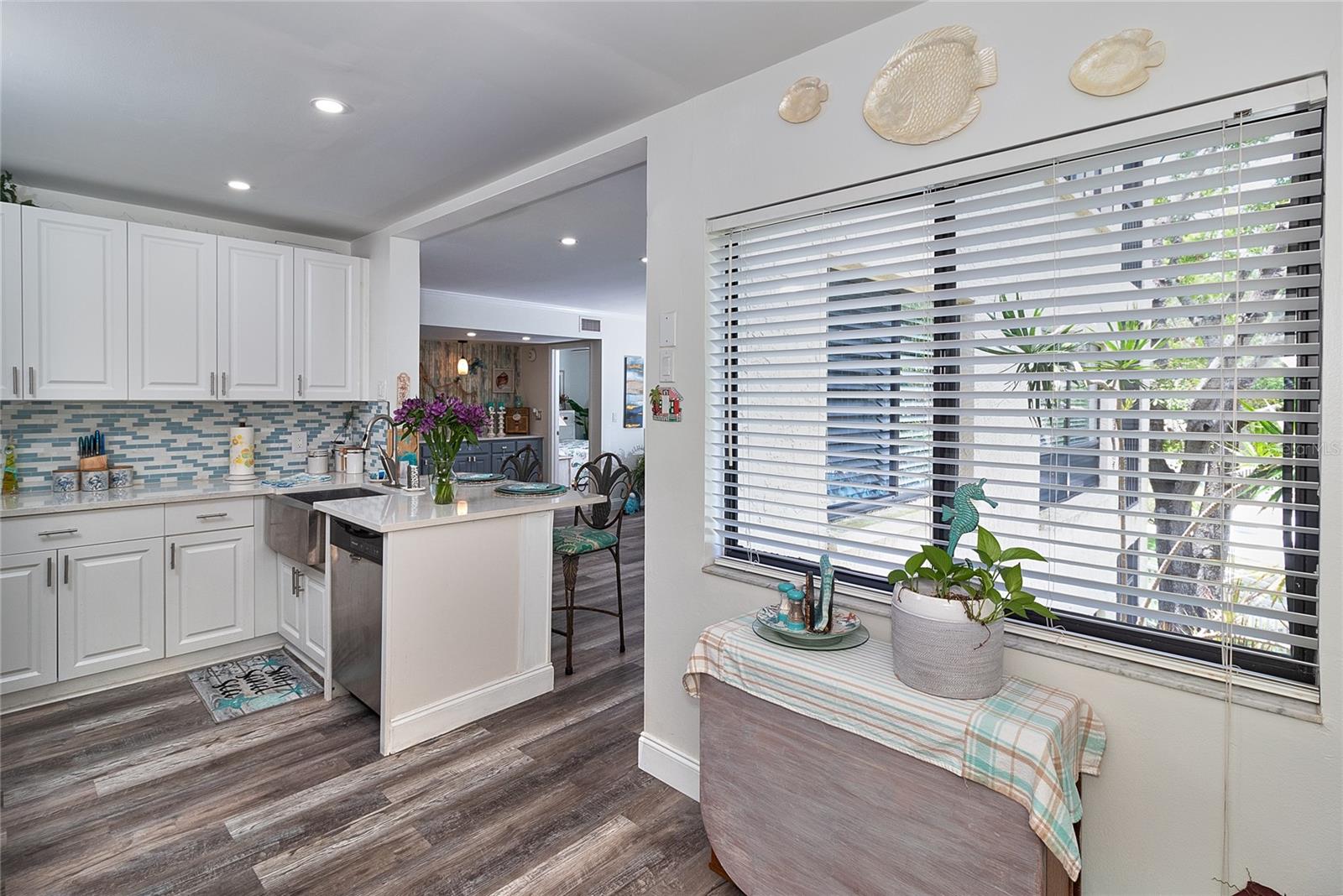 Room for a kitchen table here, overlooking the pool from this window.