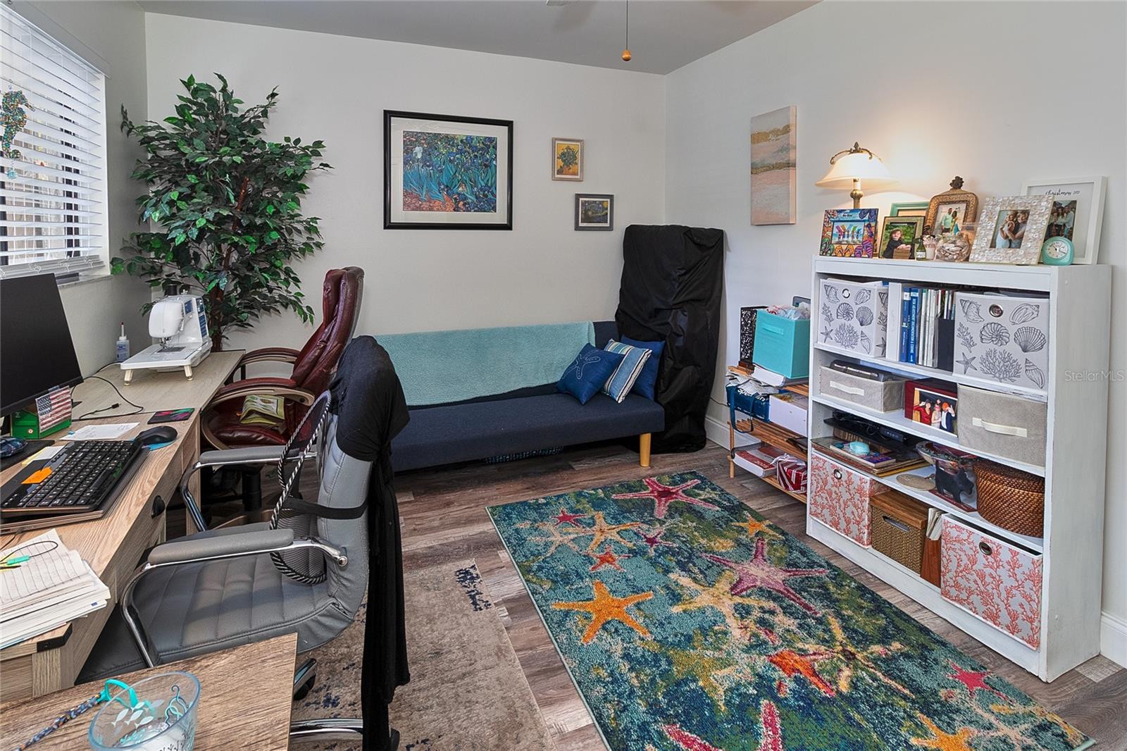 Secondary bedroom at the front of the unit. Currently used as an office.