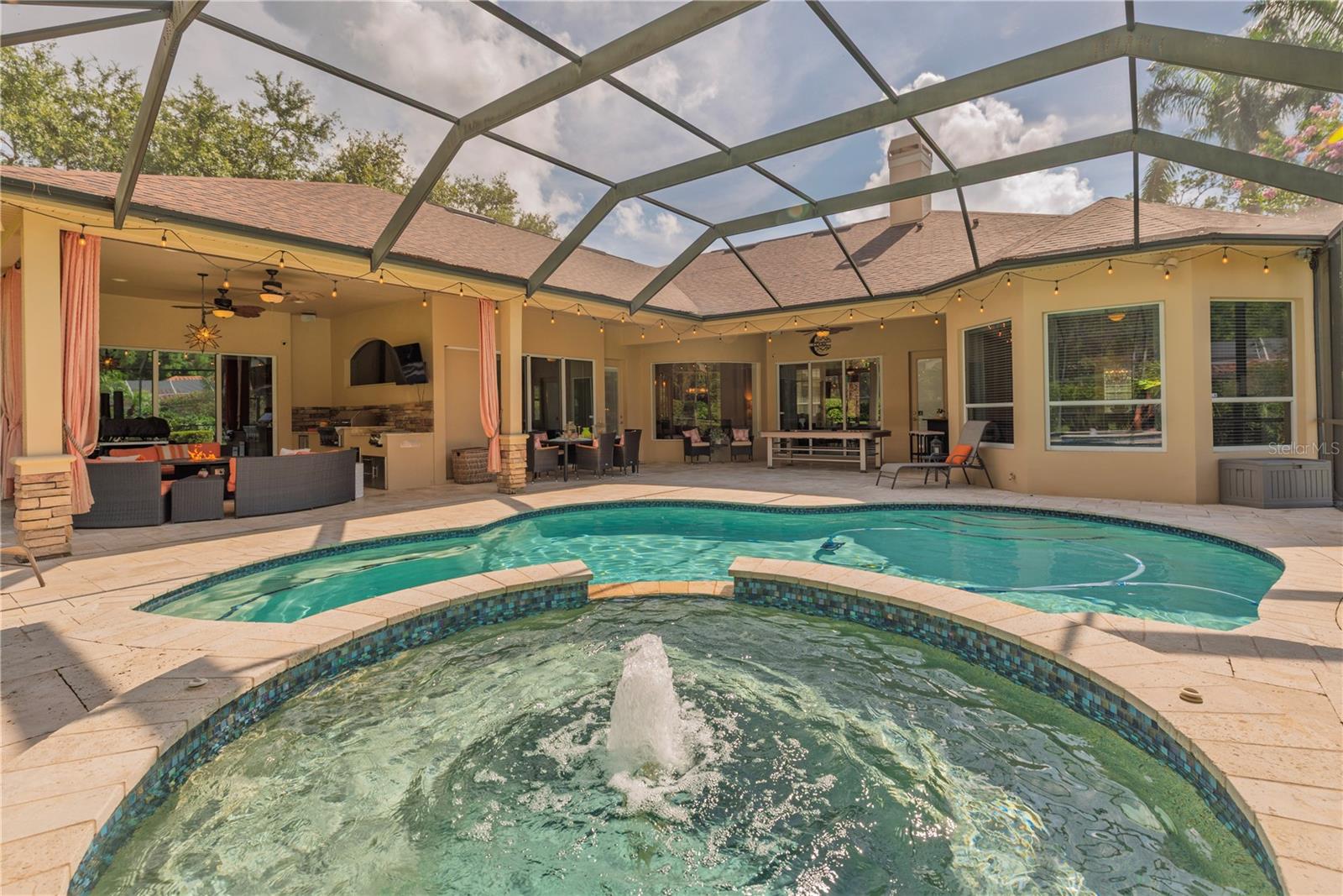 Heated, salt water pool with spillover spa.