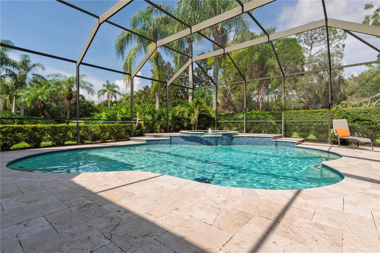 Travertine pool deck.