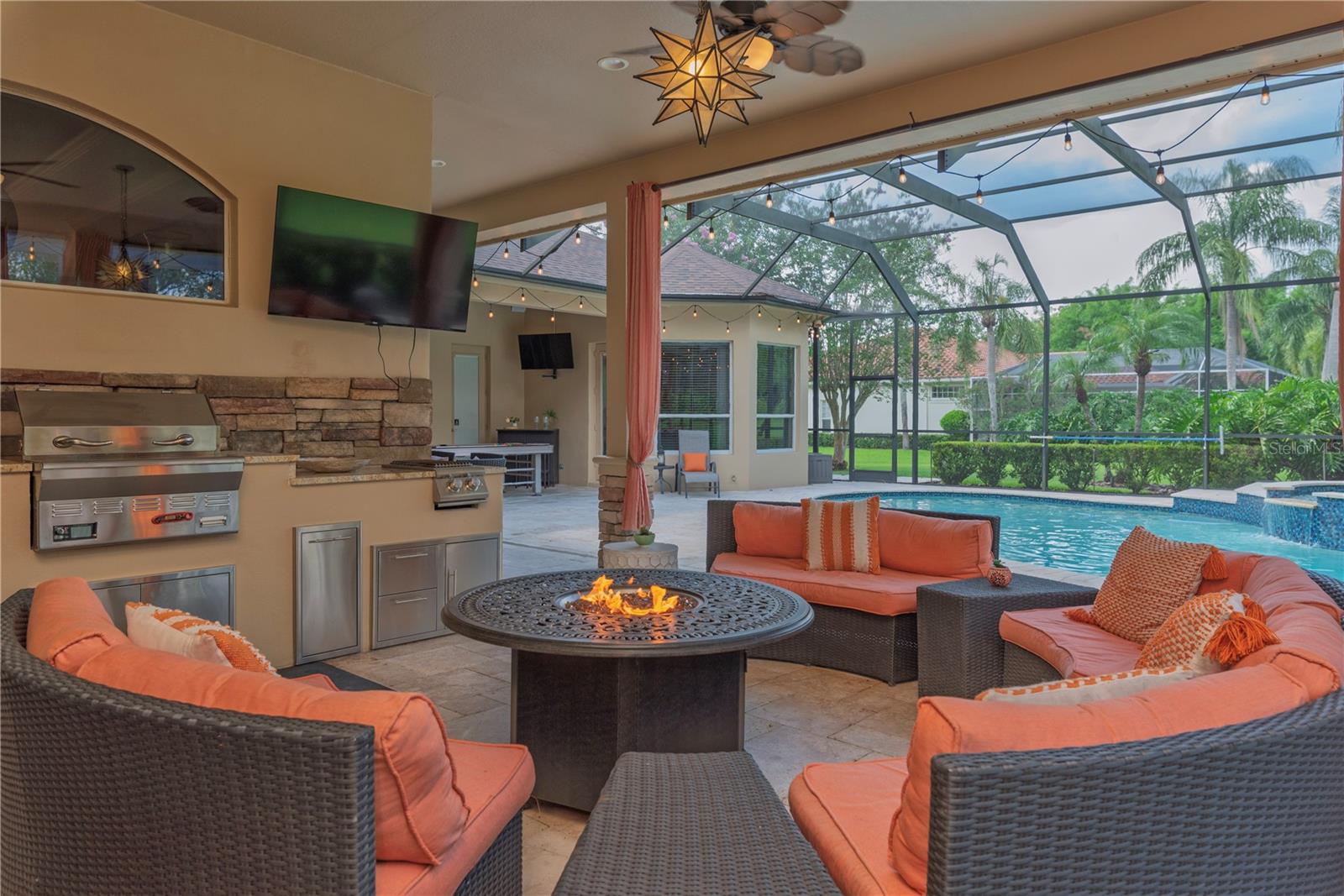 Outdoor kitchen with grill.