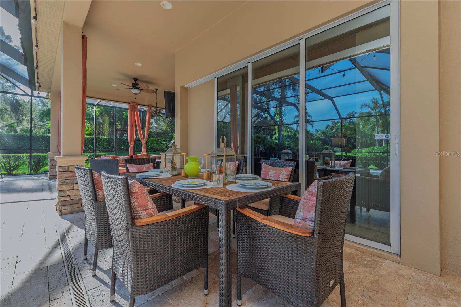 Exterior dining space on the pool lanai.