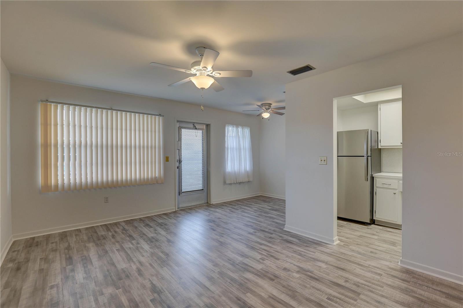 Living room with view of kitchen