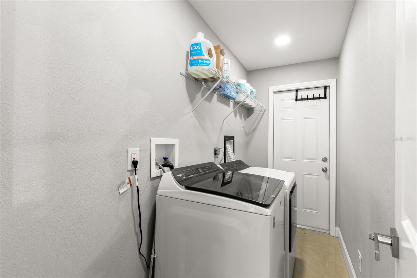 Indoor Laundry Room heading out to garage