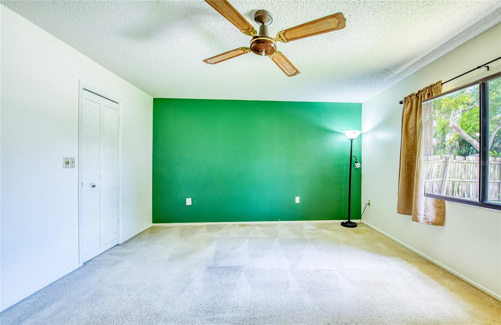 Primary Bedroom with view of large walk in closet