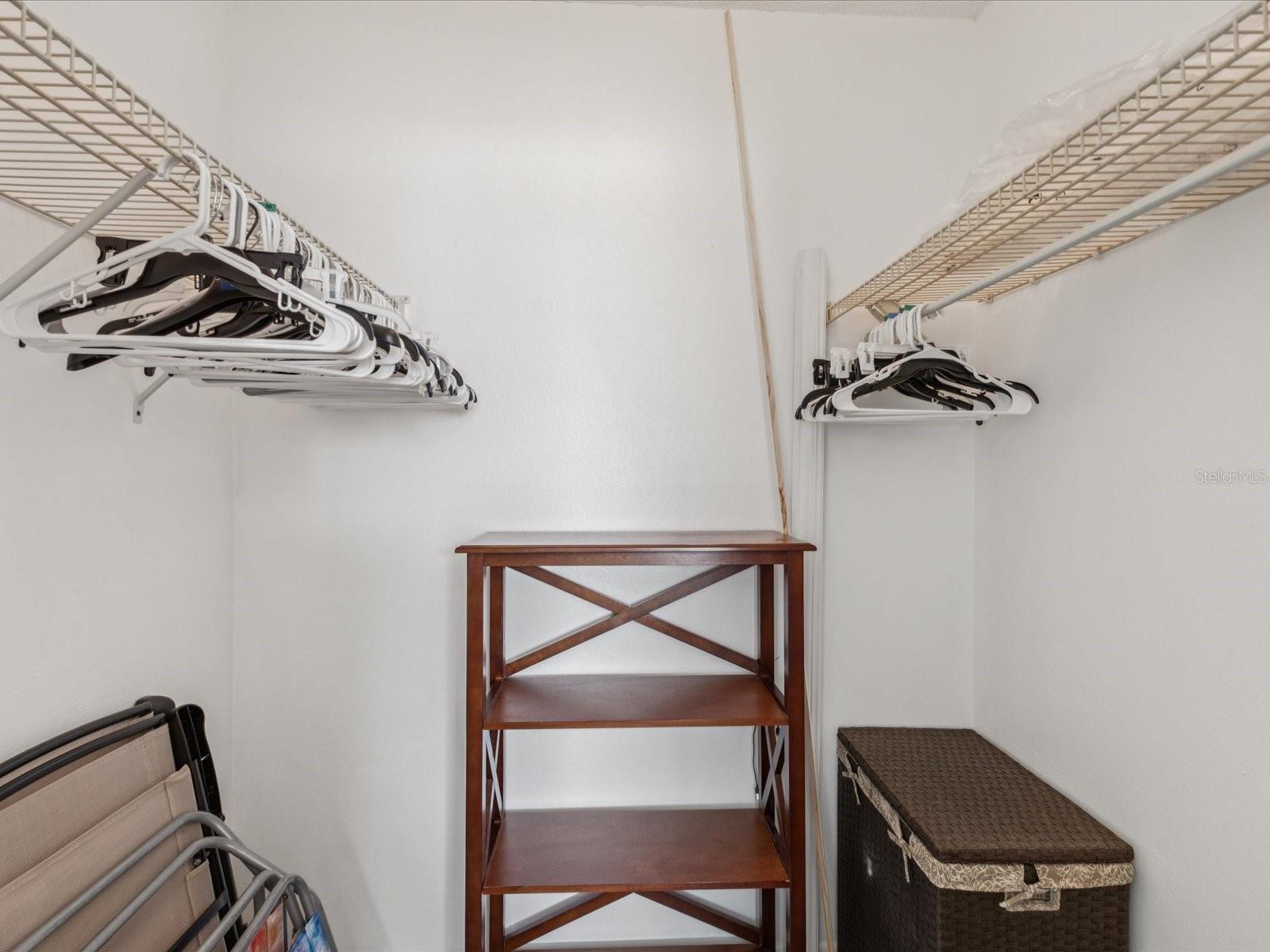 Primary Bedroom walk-in closet