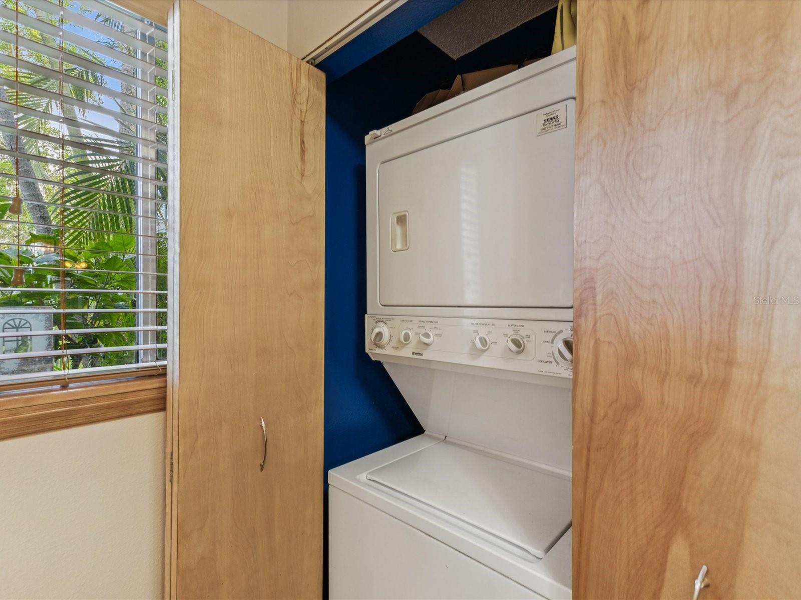 Stack washer & Dryer with extra pantry space in closet